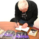 Otvoritev Bralne značke za odrasle 2026. Gost: pevec, skladatelj, pesnik in pisatelj Zoran Predin.